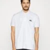 LACOSTE X NETFLIX - Poloshirt -Heren Kleding Winkel 0cf8b391235a4aa9bca8834a507559b8