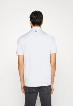 LACOSTE X NETFLIX - Poloshirt -Heren Kleding Winkel 3f0bc24895f94a41a825f286d5158454